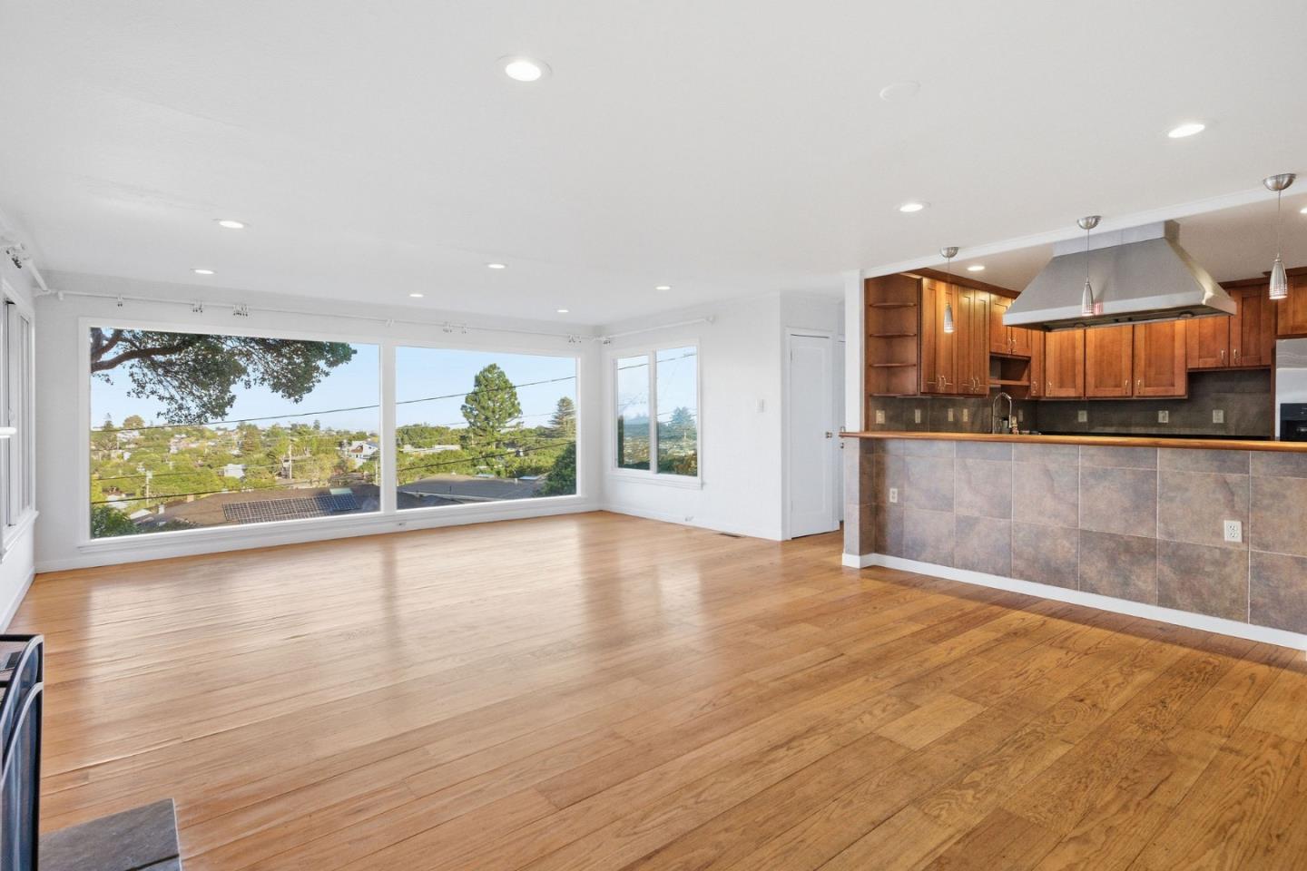2312 Wooster Avenue Belmont, CA 94002 - Photo 2 of 18 a view of a kitchen with a large window