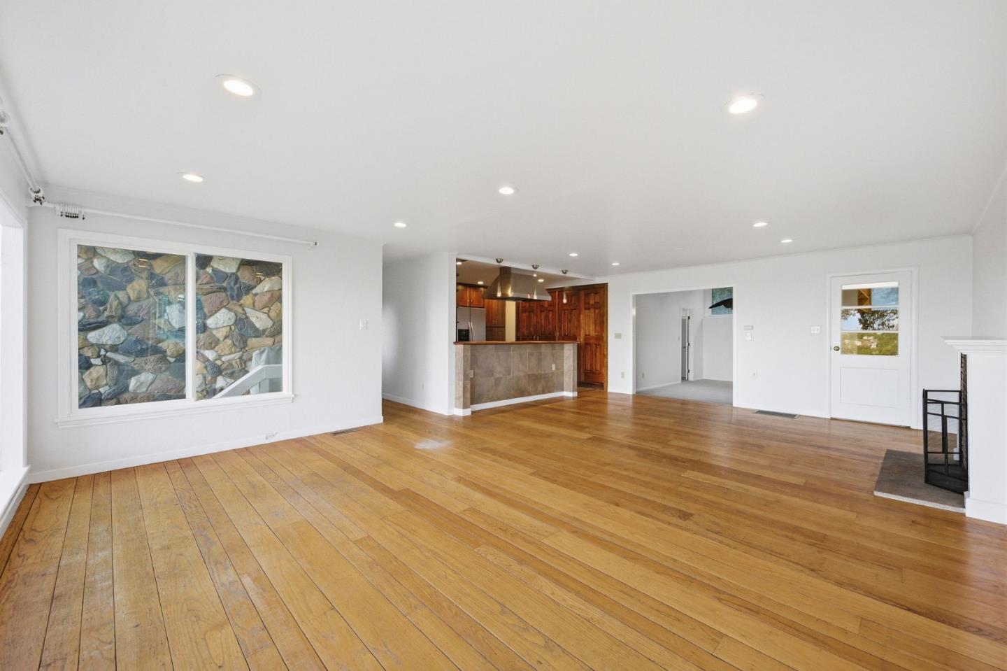 2312 Wooster Avenue Belmont, CA 94002 - Photo 4 of 18 a view of empty room with wooden floor and fan