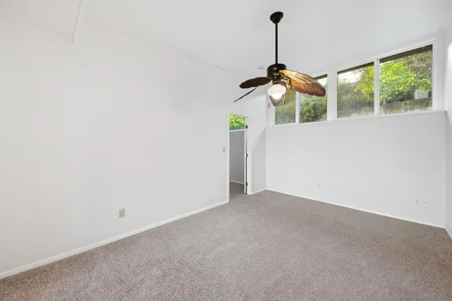 a picture of ceiling fan with a carpet