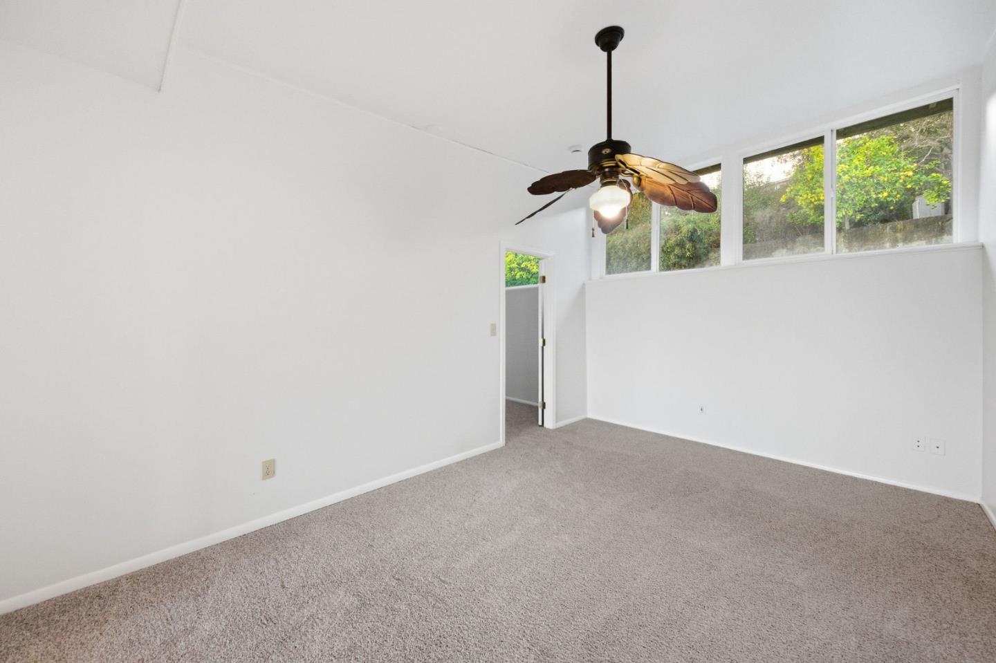 2312 Wooster Avenue Belmont, CA 94002 - Photo 8 of 18 a picture of ceiling fan with a carpet