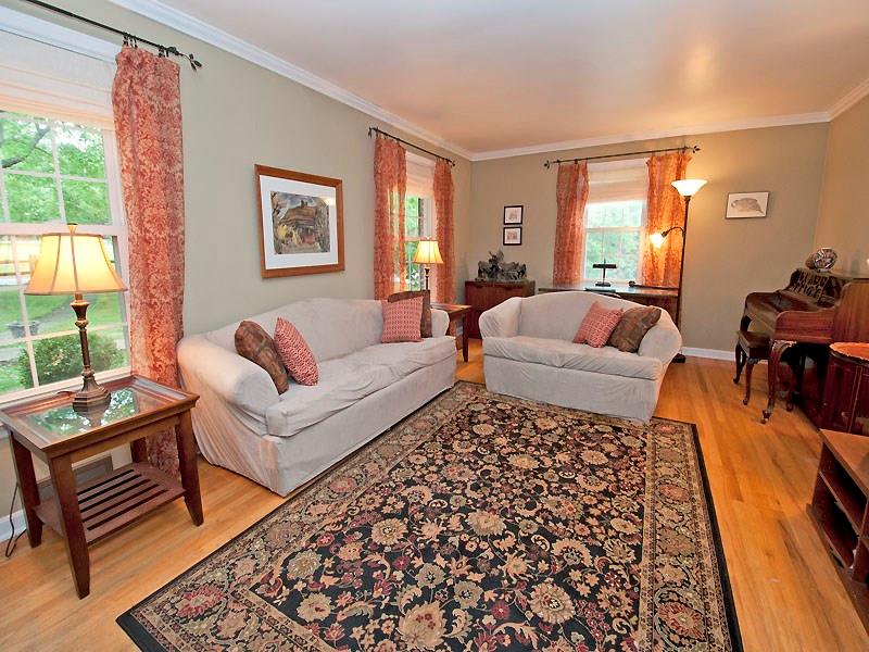 Living room could also function as a first floor den or library.
