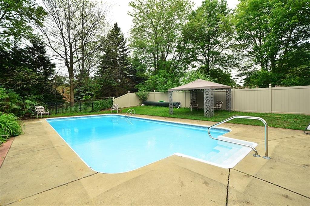 10550 Grubbs Road Wexford, PA 15090 - Photo 20 of 25 Beautiful pool offers a newer heater, newer concrete, privacy and a whole lot of yard left over!
