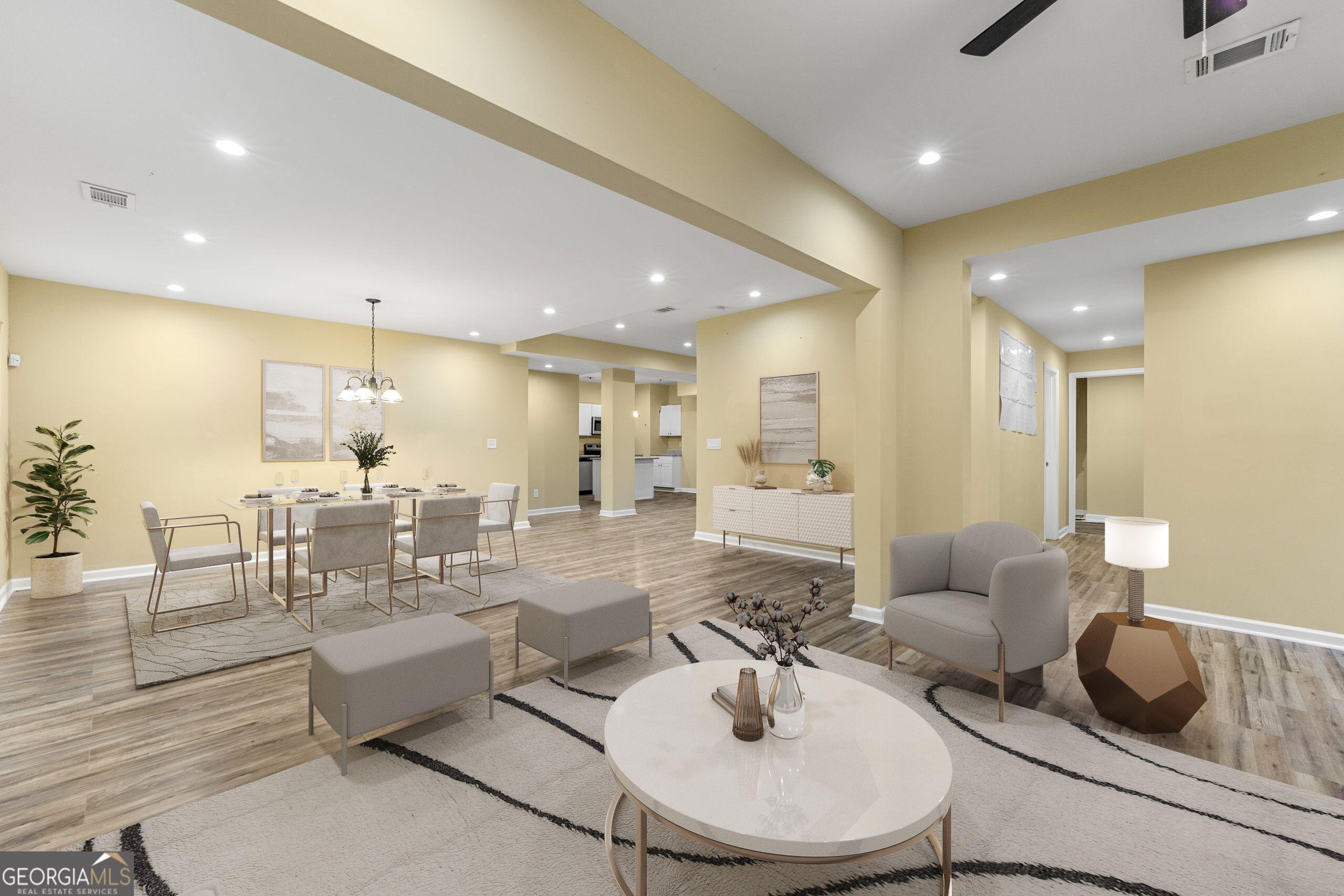 1152 Stepping Stone Lane Conyers, GA 30012 - Photo 5 of 9 a dining room with furniture and a view of kitchen