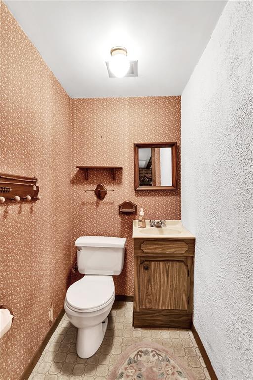 532 Valley View Road Eighty Four, PA 15330 - Photo 20 of 25 a bathroom with a toilet a sink and mirror
