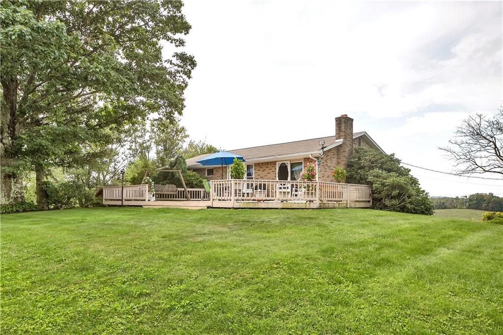 532 Valley View Road Eighty Four, PA 15330 - Photo 23 of 25 a front view of a house with a garden