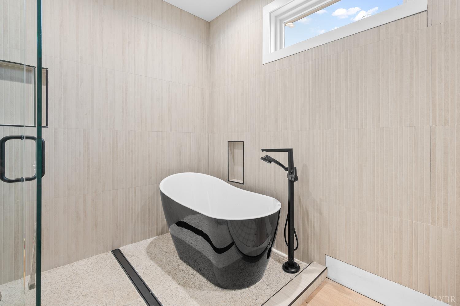 3741 Lowry Road Goode, VA 24556 - Photo 19 of 54 a picture of a bathroom with a sink and a mirror