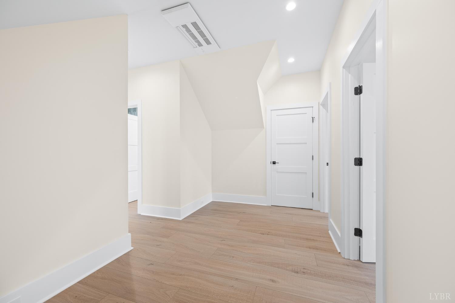 3741 Lowry Road Goode, VA 24556 - Photo 24 of 54 a view of a hallway with wooden floor