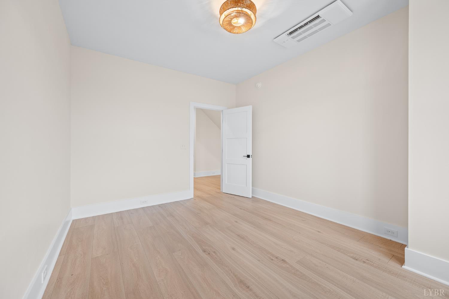 3741 Lowry Road Goode, VA 24556 - Photo 26 of 54 a view of an empty room with wooden floor