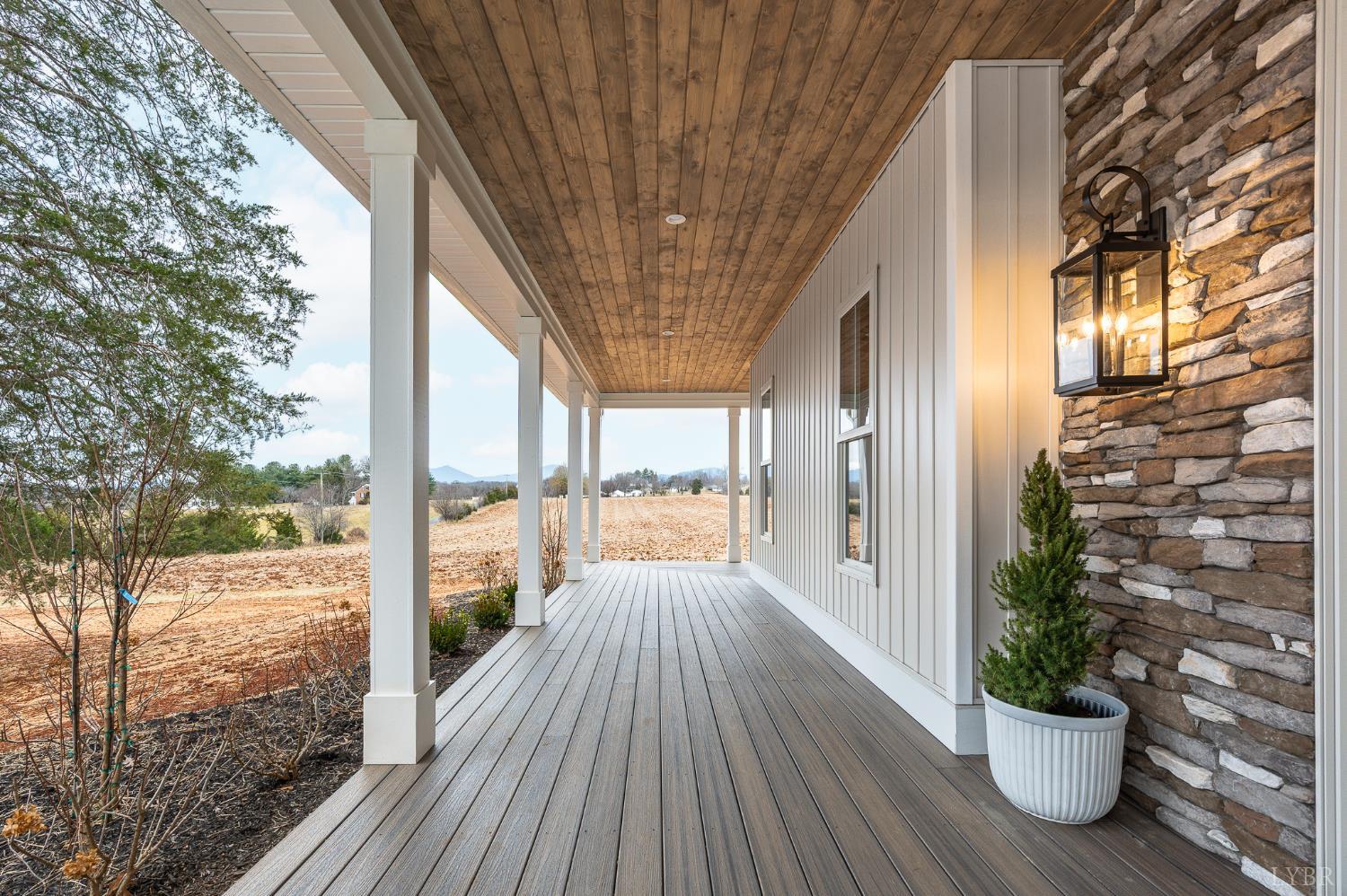 3741 Lowry Road Goode, VA 24556 - Photo 35 of 54 a view of balcony with wooden floor
