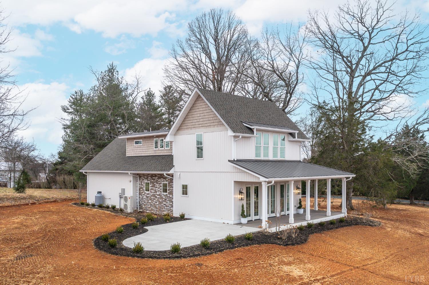 3741 Lowry Road Goode, VA 24556 - Photo 42 of 54 a view of a house with a yard