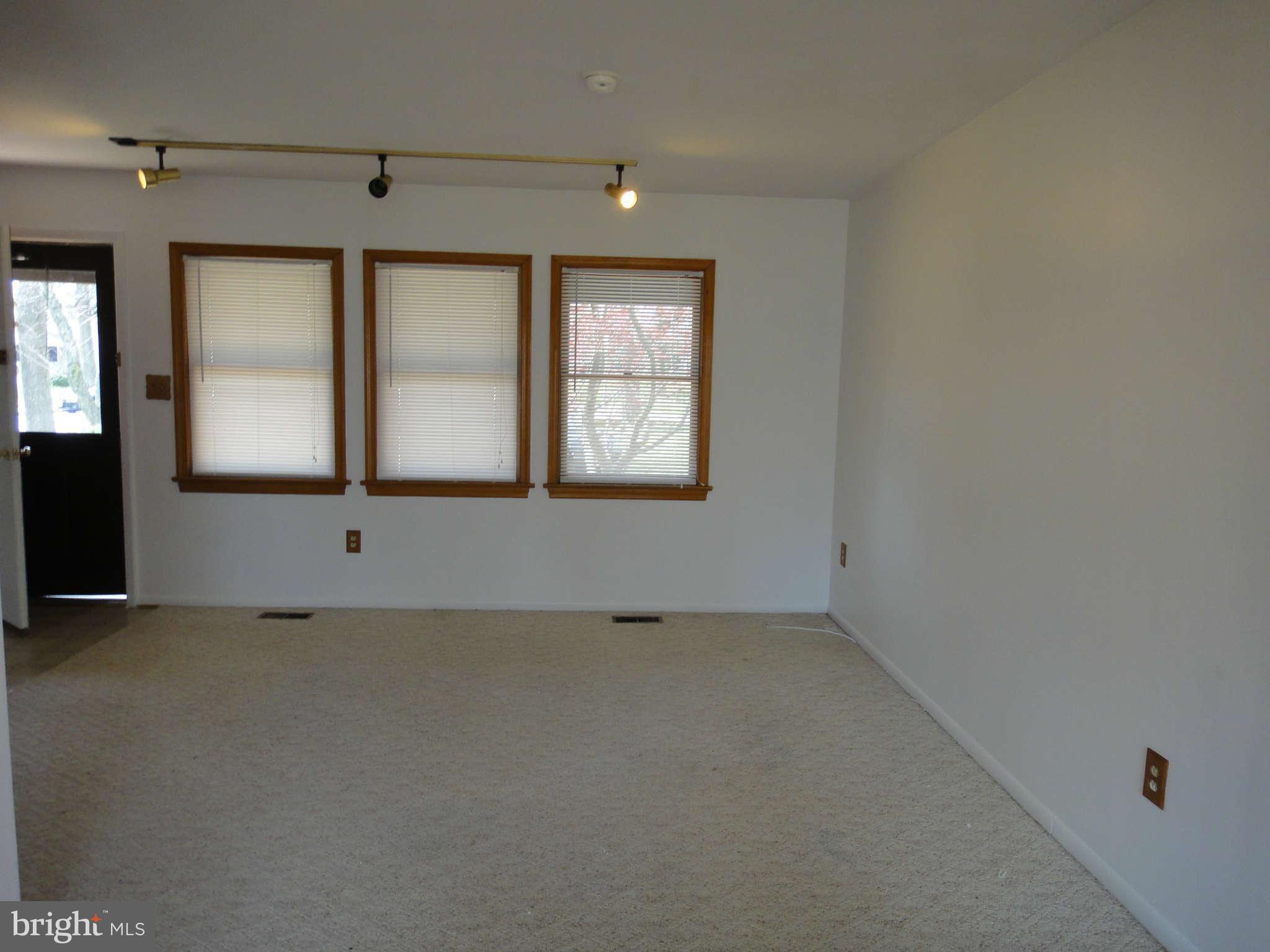 6251 Parallel Lane Columbia, MD 21045 - Photo 11 of 28 an empty room with windows