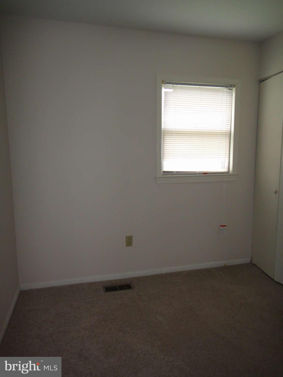 6251 Parallel Lane Columbia, MD 21045 - Photo 15 of 28 an empty room with a window