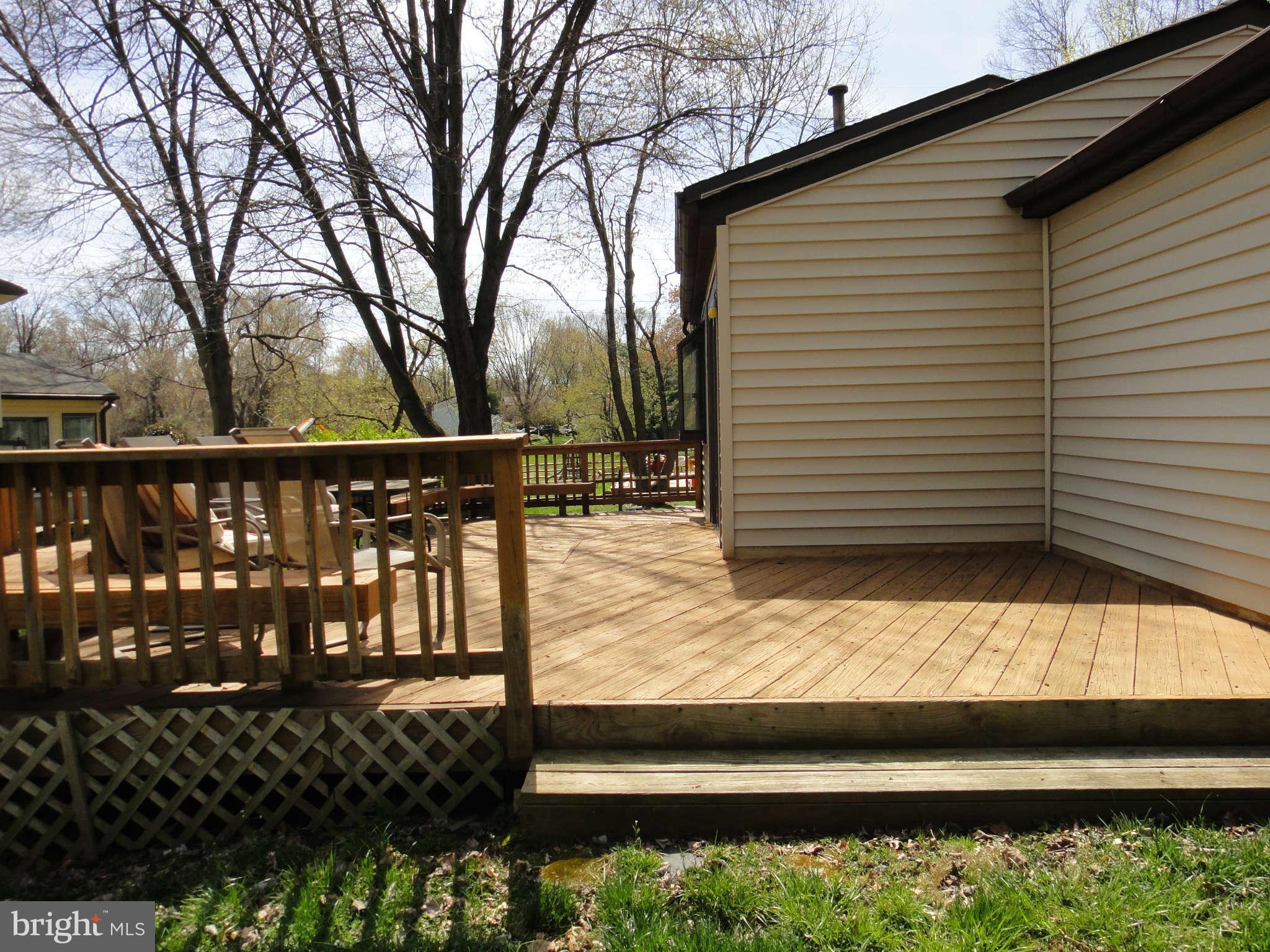 6251 Parallel Lane Columbia, MD 21045 - Photo 25 of 28 a view of a yard with wooden floor and fence