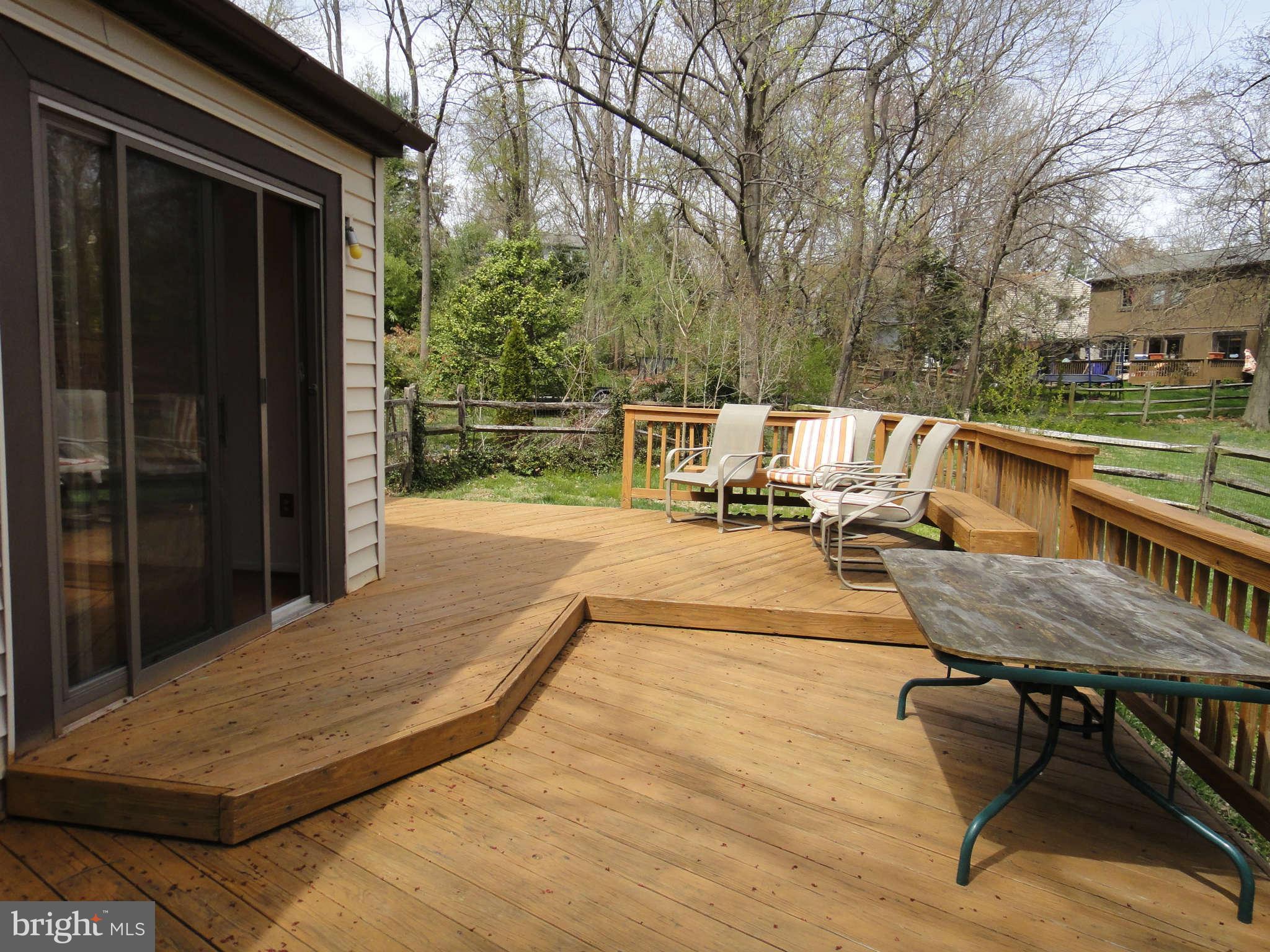 6251 Parallel Lane Columbia, MD 21045 - Photo 27 of 28 a view of a patio with chairs and a table