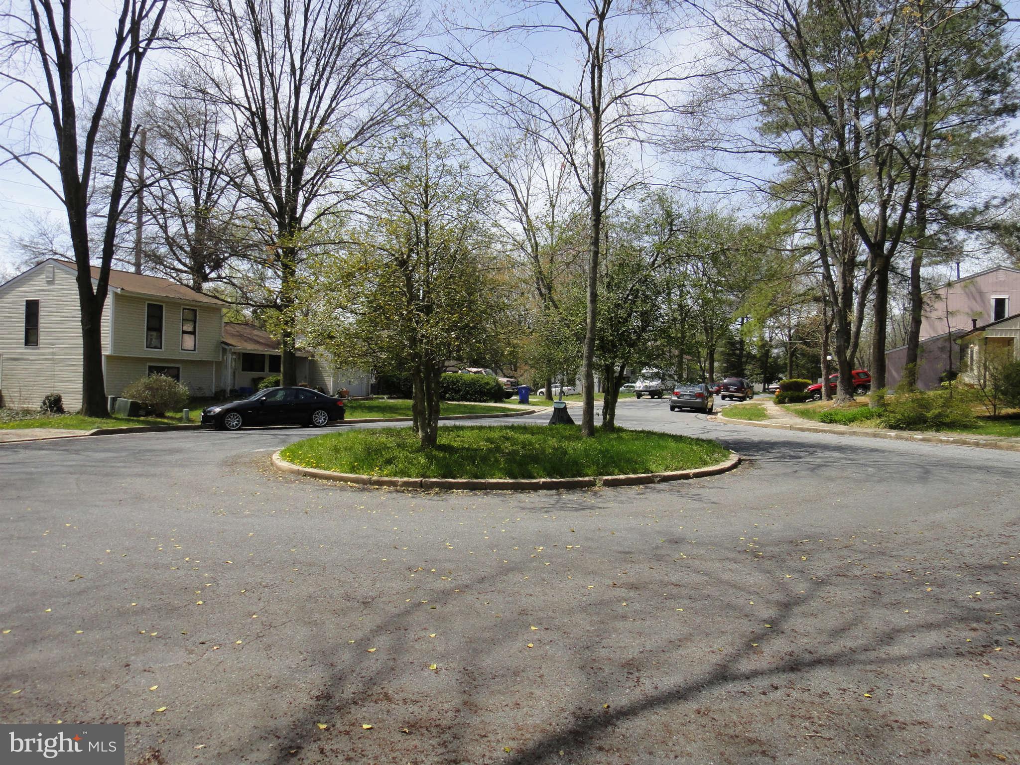 6251 Parallel Lane Columbia, MD 21045 - Photo 4 of 28 a view of a playground with basketball court