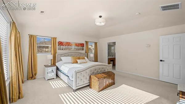 a room with a bed and a table