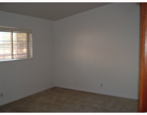3464 Topeka Street Corpus Christi, TX 78411 - Photo 4 of 6 an empty room with a window