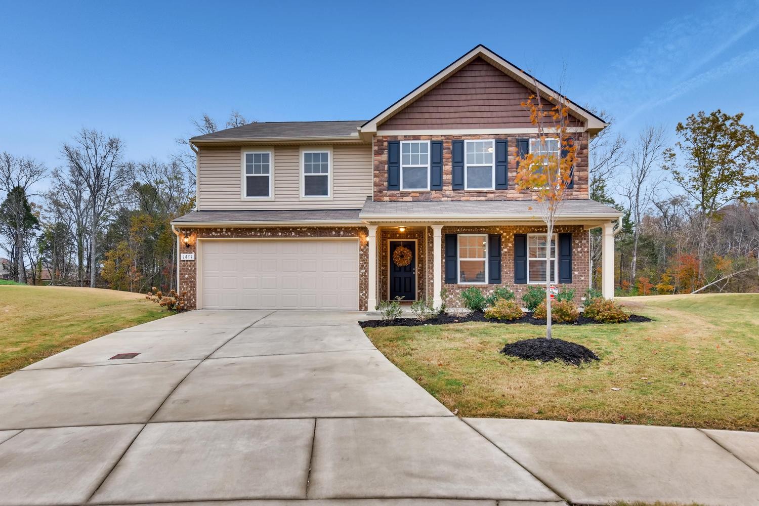 1471 Old Stone Road Lebanon, TN 37087 - Photo 1 of 27 a front view of a house with garden