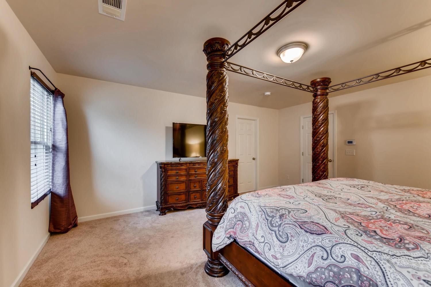 1471 Old Stone Road Lebanon, TN 37087 - Photo 13 of 27 a bedroom with a bed and a flat screen tv