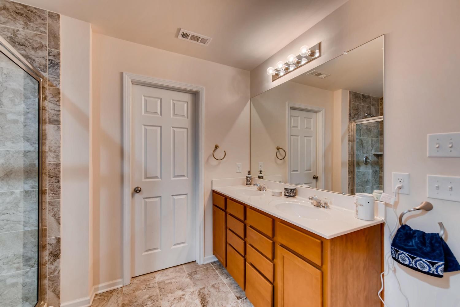 1471 Old Stone Road Lebanon, TN 37087 - Photo 15 of 27 a bathroom with a sink double vanity and a mirror