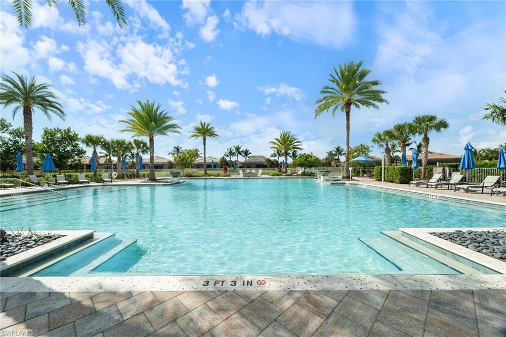 a view of a lake with a yard