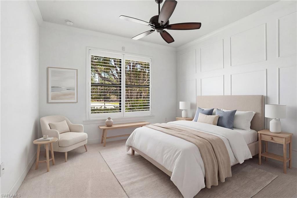 9436 Whooping Crane Way Naples, FL 34120 - Photo 13 of 32 a bedroom with a bed and a window