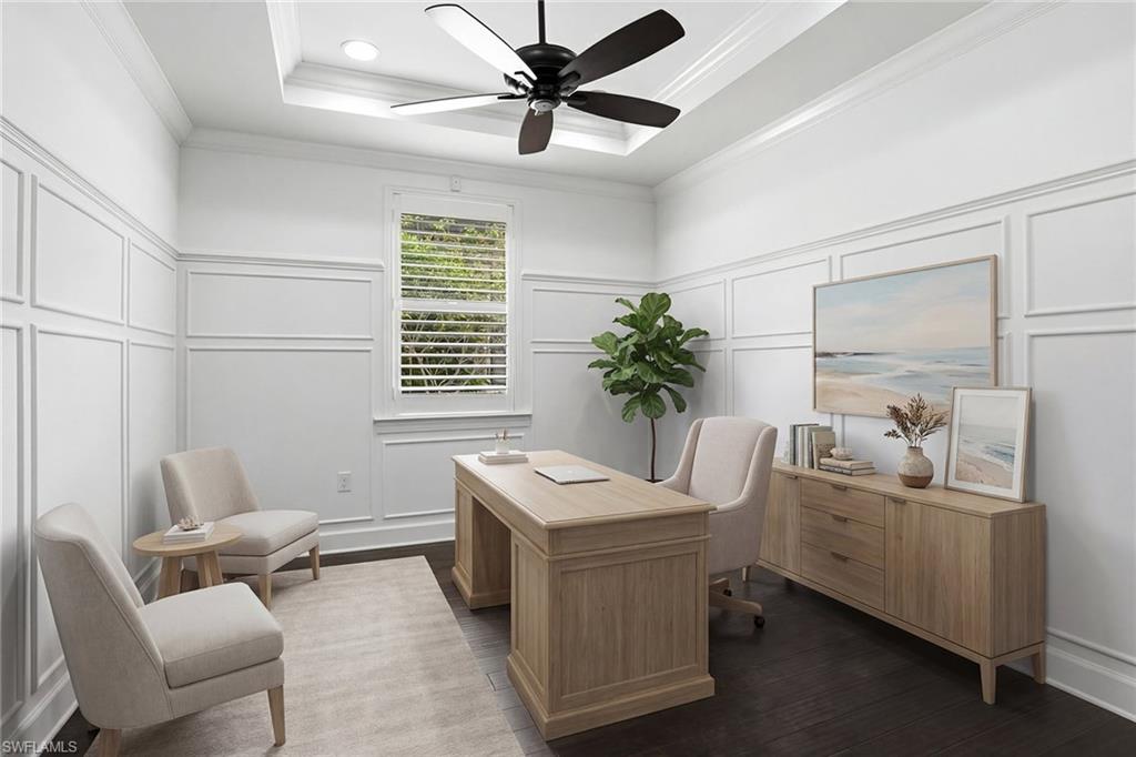 9436 Whooping Crane Way Naples, FL 34120 - Photo 14 of 32 a room with a couch and a potted plant