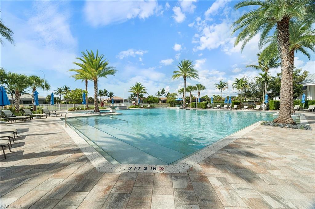 9436 Whooping Crane Way Naples, FL 34120 - Photo 29 of 32 a view of swimming pool with a yard