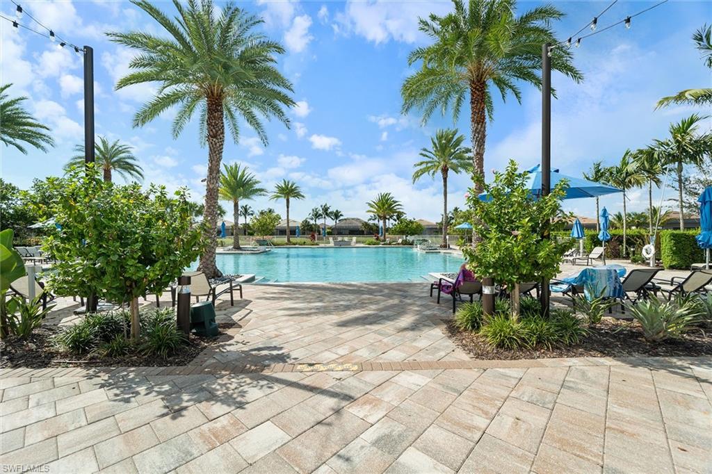 9436 Whooping Crane Way Naples, FL 34120 - Photo 30 of 32 a lake with palm trees