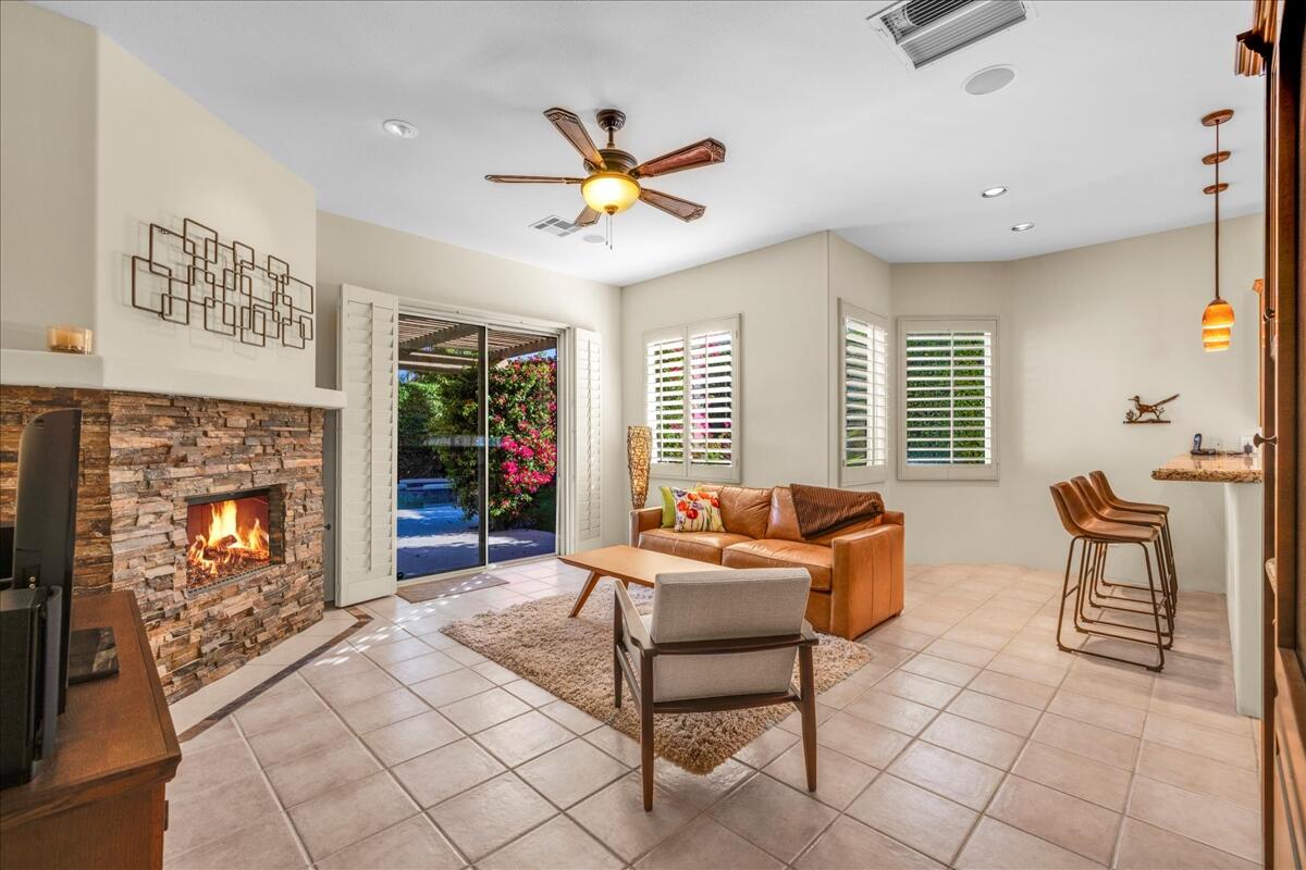 58 Payson Circle Palm Desert, CA 92211 - Photo 15 of 41 a living room with furniture and a fireplace