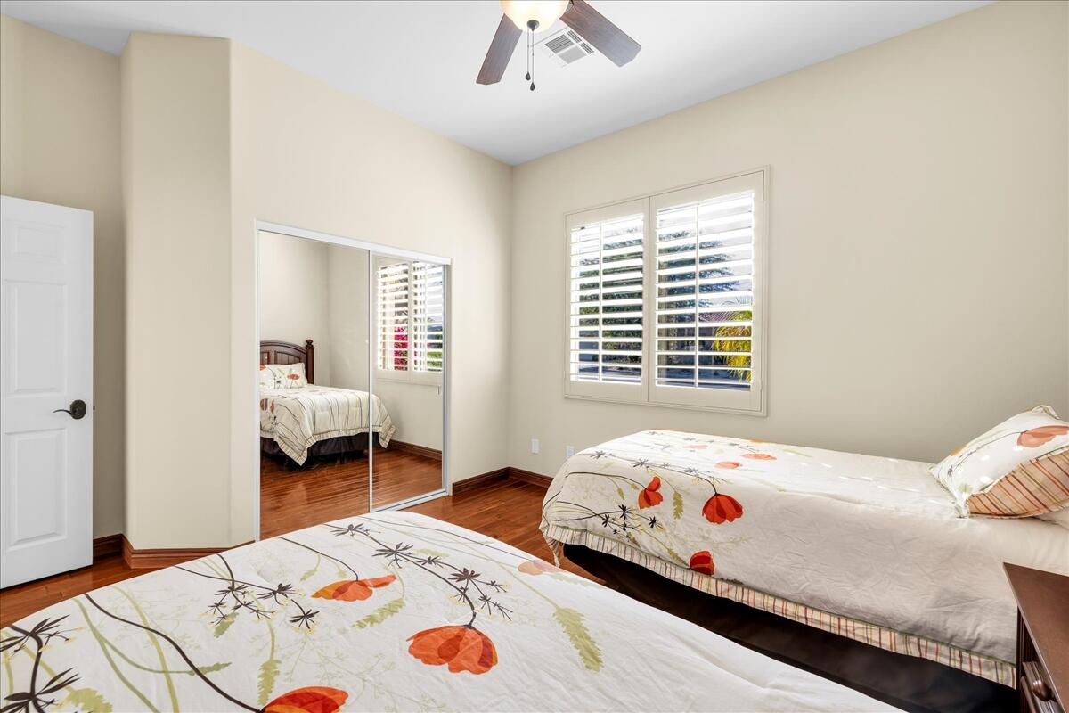 58 Payson Circle Palm Desert, CA 92211 - Photo 28 of 41 a bedroom with a bed and a window