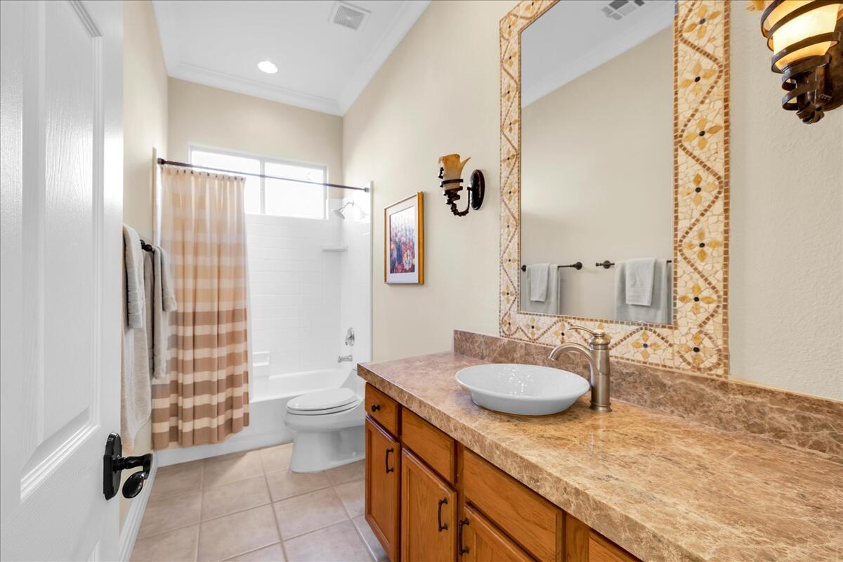 58 Payson Circle Palm Desert, CA 92211 - Photo 29 of 41 a bathroom with a granite countertop sink toilet and shower