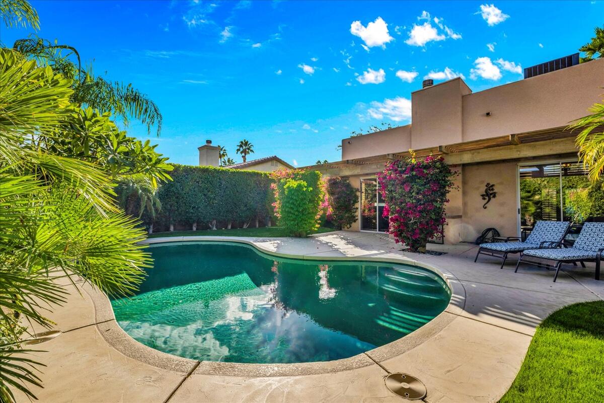 58 Payson Circle Palm Desert, CA 92211 - Photo 33 of 41 a view of a swimming pool with a patio