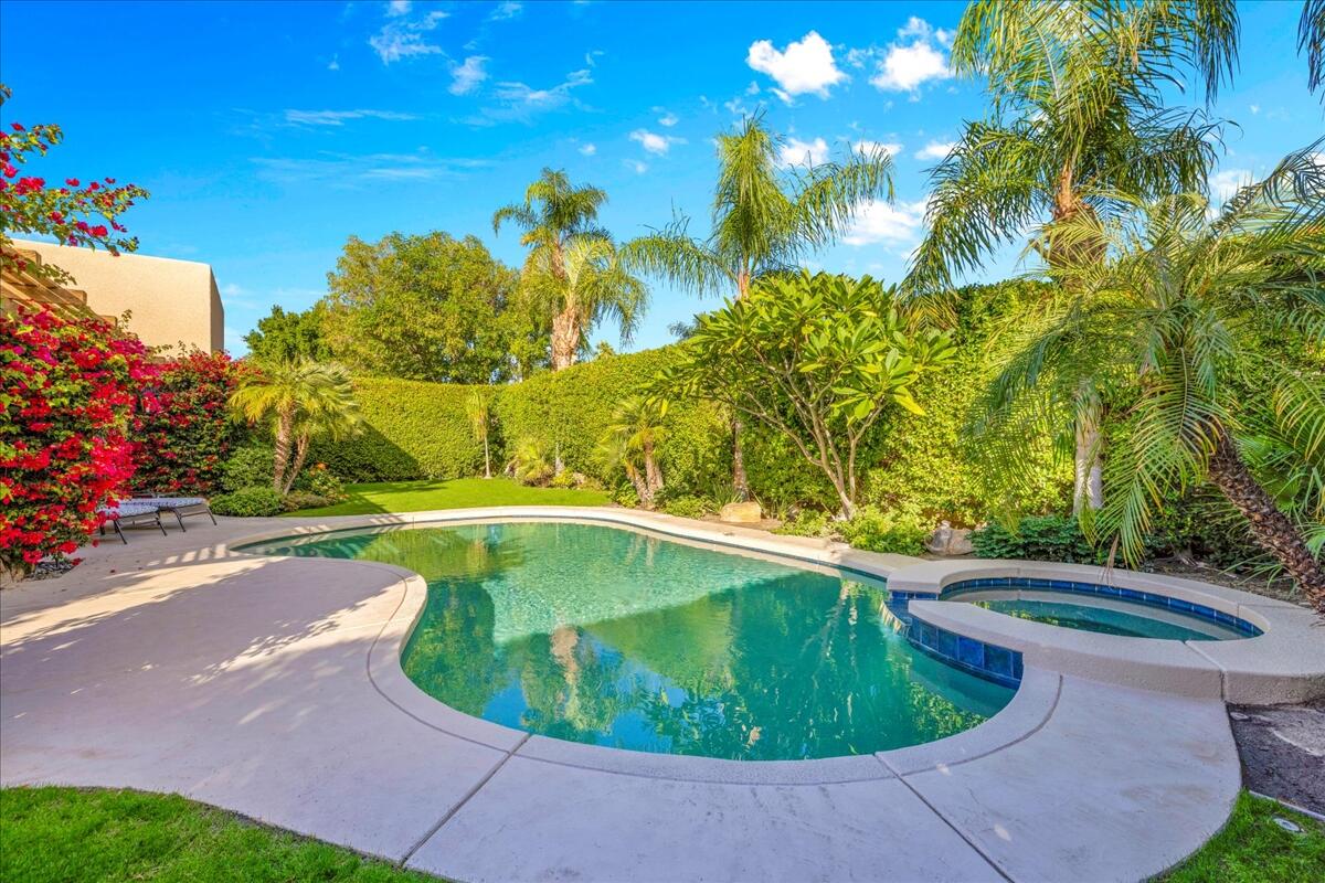 58 Payson Circle Palm Desert, CA 92211 - Photo 35 of 41 a view of a swimming pool with a yard