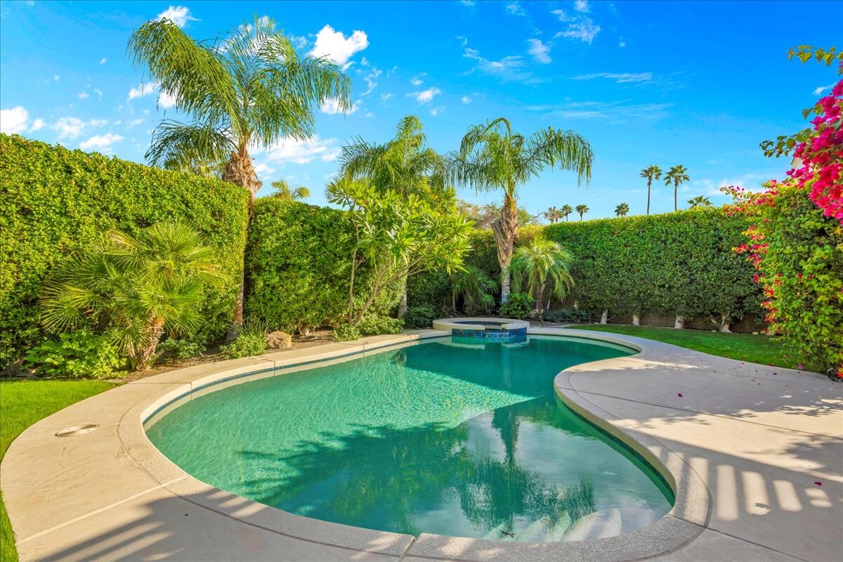58 Payson Circle Palm Desert, CA 92211 - Photo 36 of 41 a view of a swimming pool with a yard