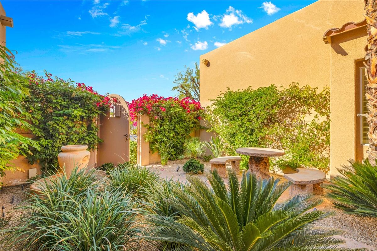 58 Payson Circle Palm Desert, CA 92211 - Photo 4 of 41 a view of a flower in a garden