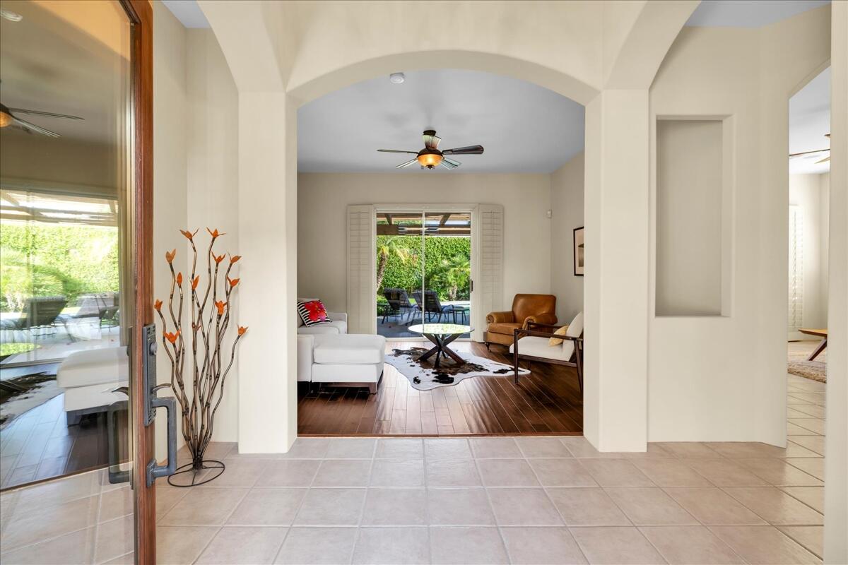 58 Payson Circle Palm Desert, CA 92211 - Photo 6 of 41 a living room with furniture a window and a flat screen tv