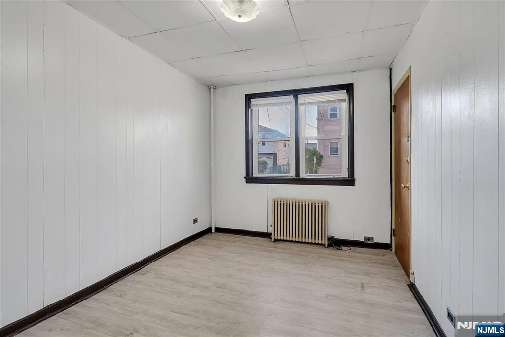 10 Irving Place Garfield, NJ 07026 - Photo 11 of 35 an empty room with windows