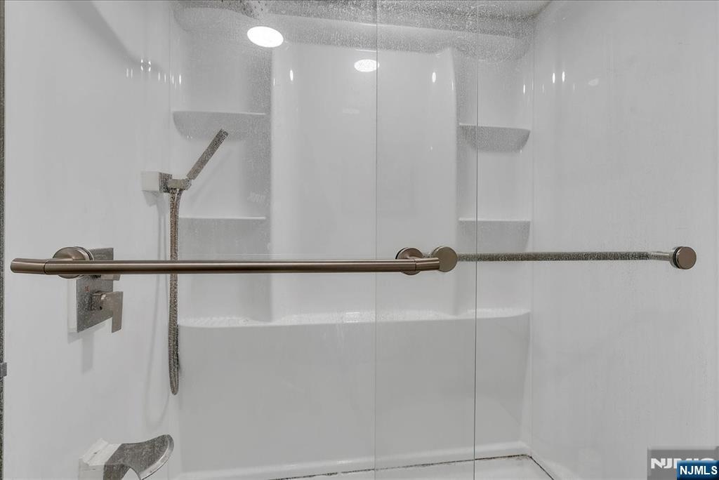 10 Irving Place Garfield, NJ 07026 - Photo 19 of 35 a view of a room with a shower