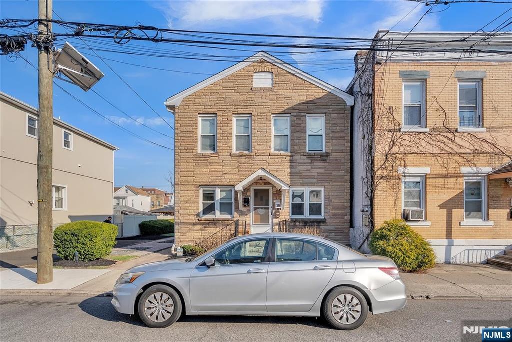 10 Irving Place Garfield, NJ 07026 - Photo 2 of 35 a front view of a house with parking space