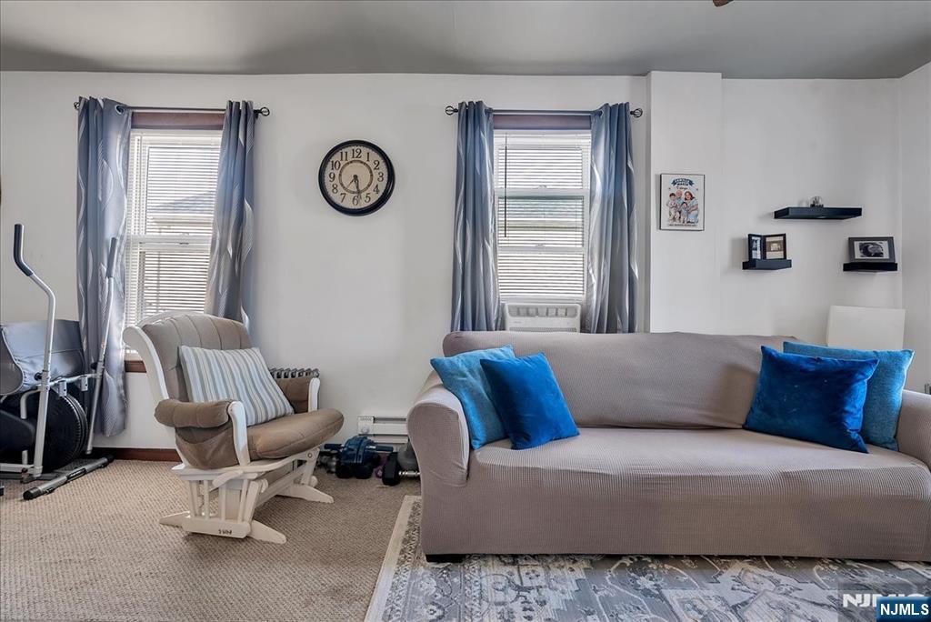 10 Irving Place Garfield, NJ 07026 - Photo 24 of 35 a living room with furniture and a window