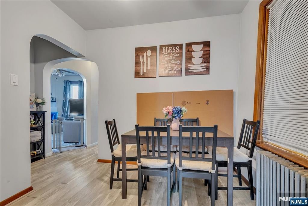 10 Irving Place Garfield, NJ 07026 - Photo 25 of 35 a view of a dining room with furniture and wooden floor