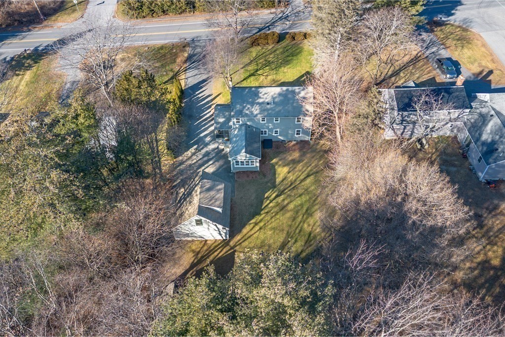 111 Groton School Road Ayer, MA 01432 - Photo 34 of 41 a aerial view of a house with a yard