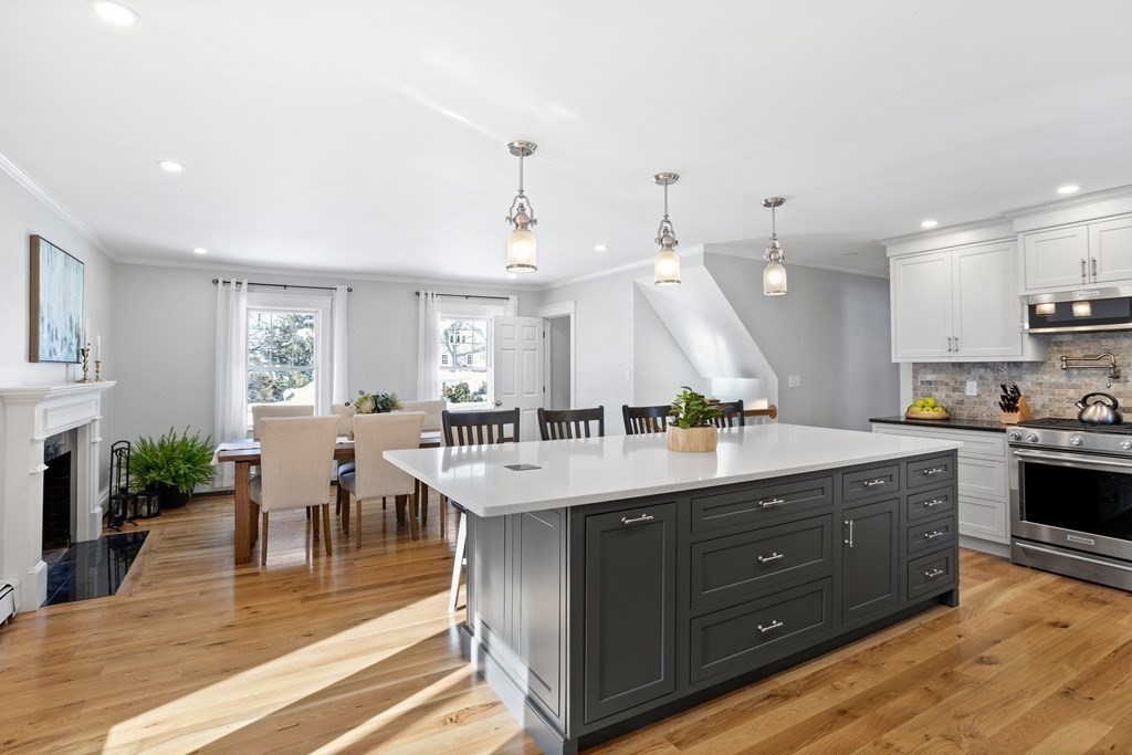 111 Groton School Road Ayer, MA 01432 - Photo 8 of 41 a large kitchen with lots of counter space and sink