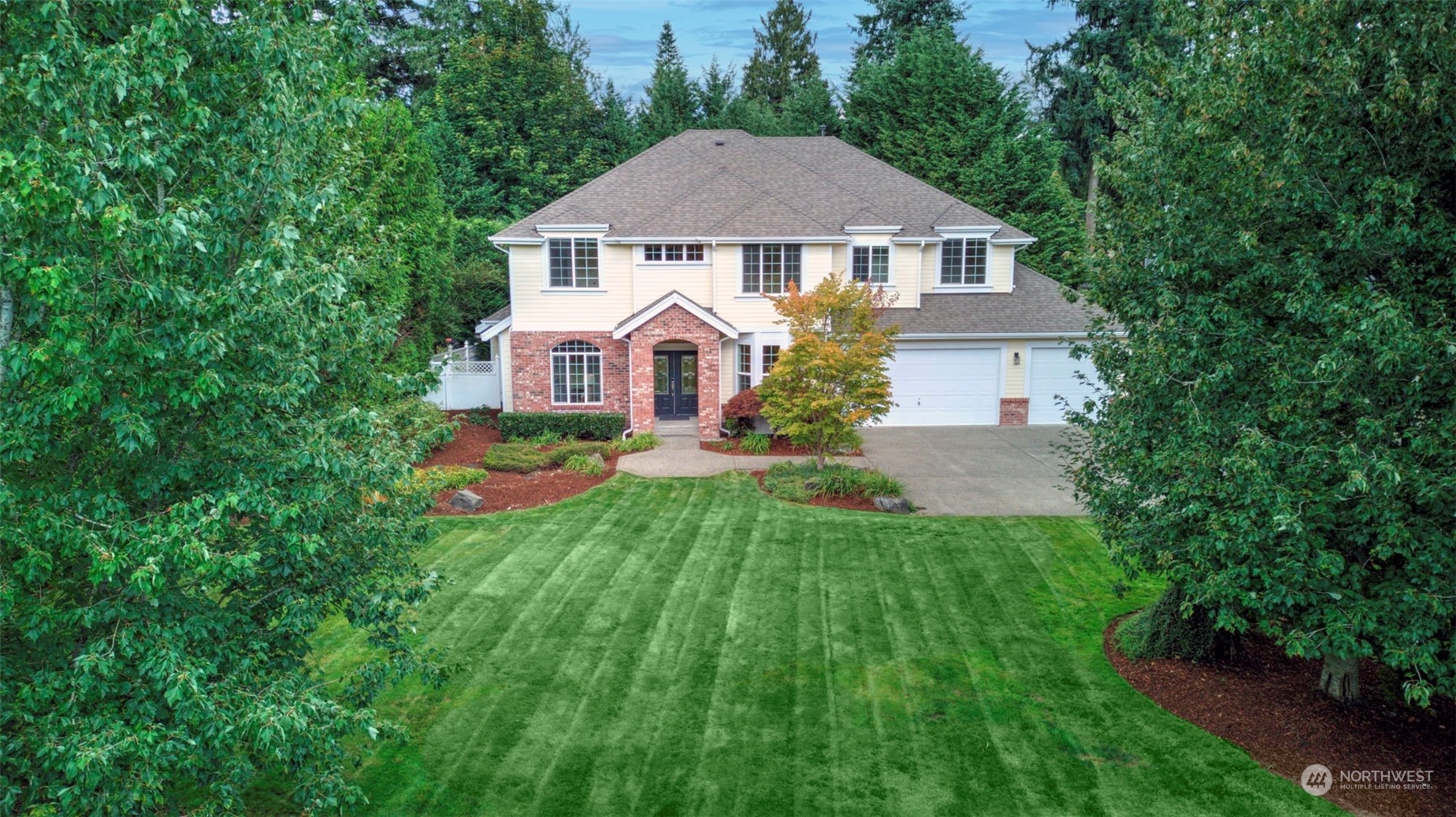 20622 Southeast 162nd Way Renton, WA 98059 - Photo 1 of 27 a front view of a house with garden