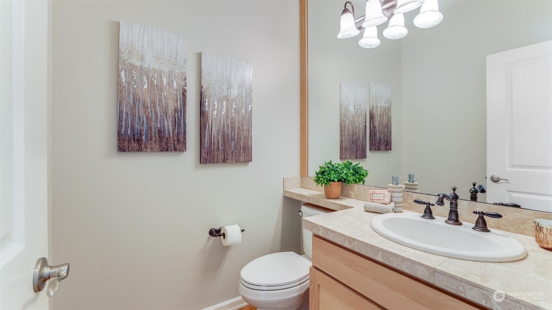 20622 Southeast 162nd Way Renton, WA 98059 - Photo 13 of 27 a bathroom with a toilet a sink and mirror