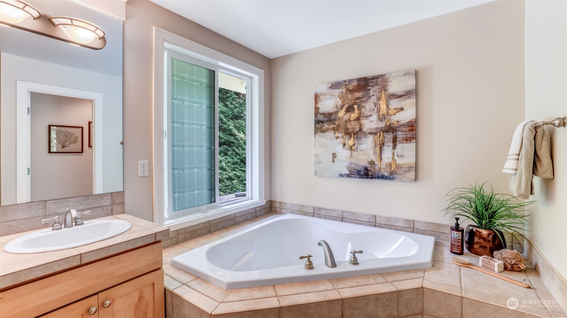 20622 Southeast 162nd Way Renton, WA 98059 - Photo 16 of 27 a white bath tub sitting next to a white sink