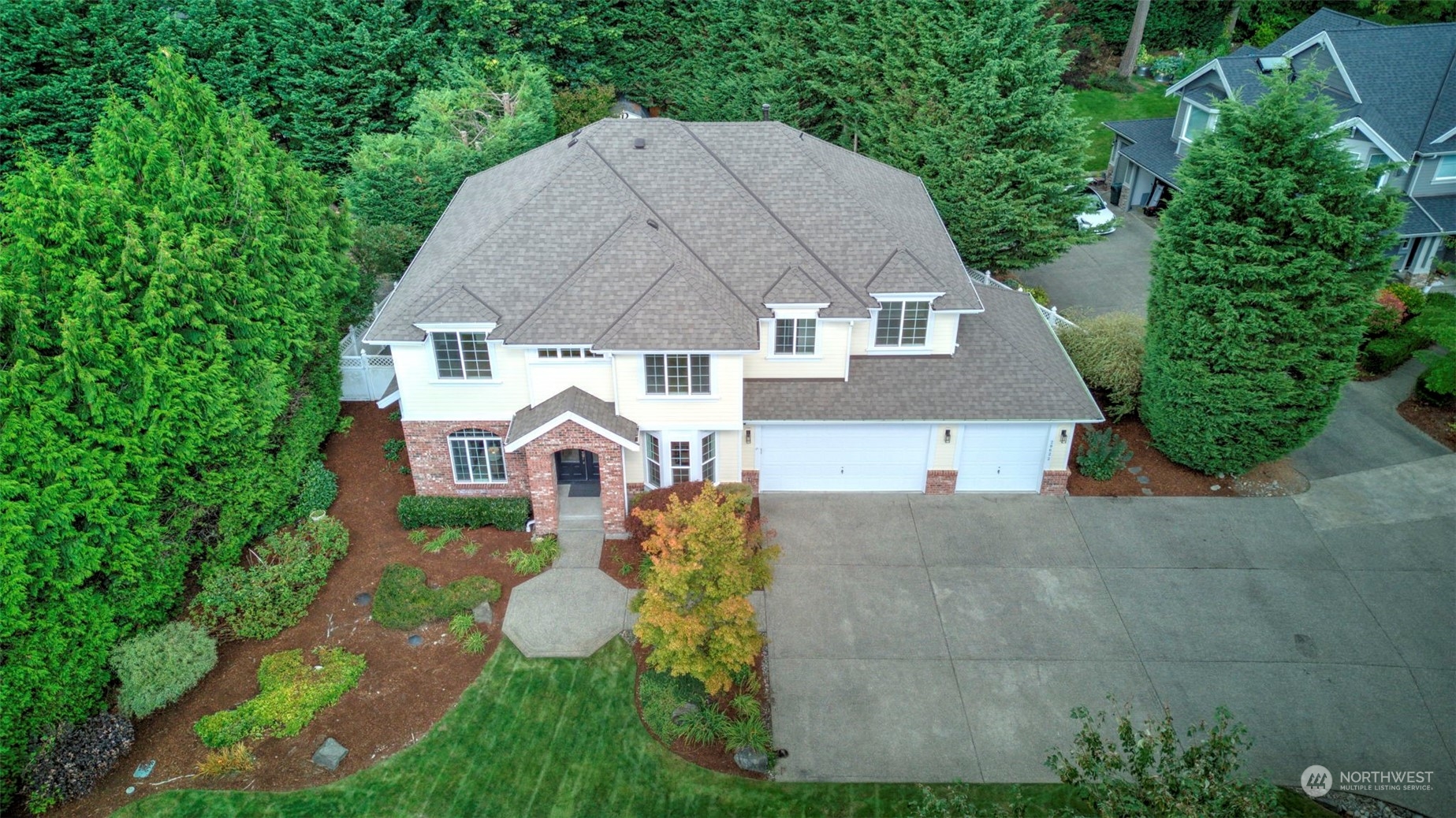 20622 Southeast 162nd Way Renton, WA 98059 - Photo 27 of 27 an aerial view of a house with a yard and a garden