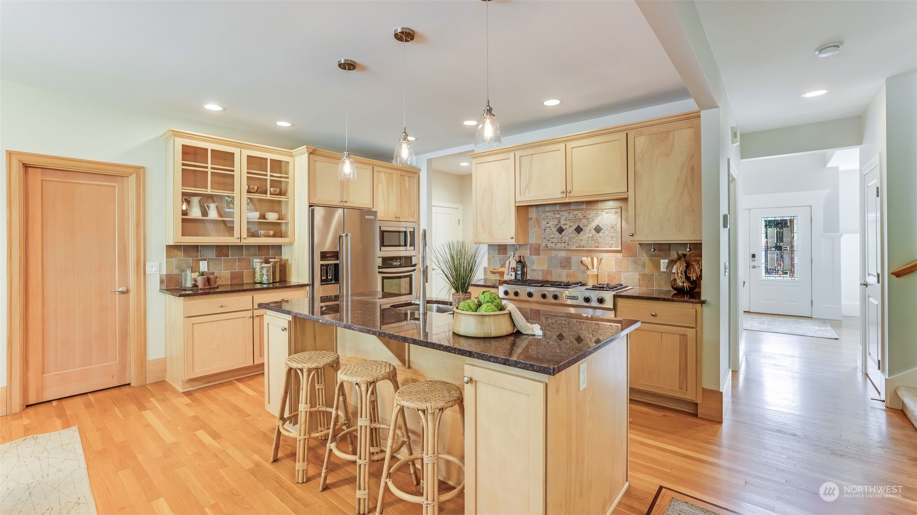 20622 Southeast 162nd Way Renton, WA 98059 - Photo 9 of 27 a kitchen with stainless steel appliances granite countertop a refrigerator and a stove top oven