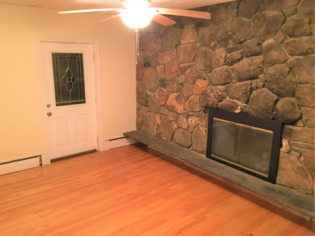 391 Langley Road, Unit 2 Newton, MA 02459 - Photo 1 of 12 a view of an empty room